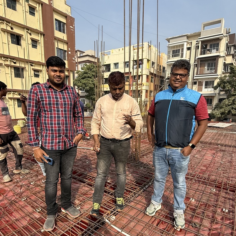 National Construction team working on a building project in Kolkata